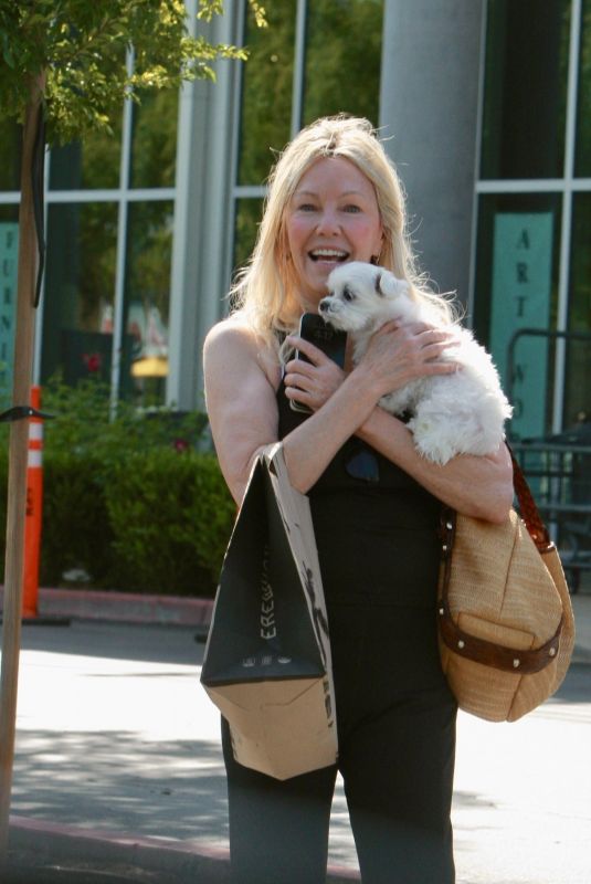 HEATHER LOCKLEAR Out Shopping with Her Dog at Erewhon 06/25/2025