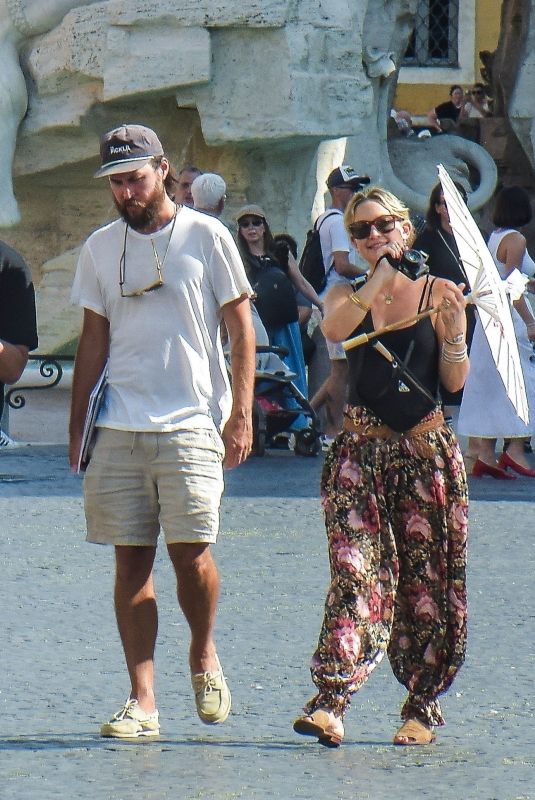 KATE HUDSON and Danny Fujikawa Out for Lunch at Pierluigi Restaurant in Rome 06/27/2025