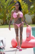 KATIE PRICE in a Pink Barbie Bikini 06/14/2025