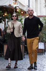 LILY COLLINS and Charlie Mcdowell Out in Rome 05/14/2025