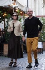 LILY COLLINS and Charlie Mcdowell Out in Rome 05/14/2025