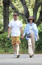 LILY COLLINS and Charlie Mcdowell Out in Villa Borghese Park in Rome 05/15/2025