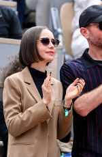 LILY COLLINS at French Open at Roland Garros in Paris 06/08/2025