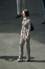 LILY COLLINS Filming a Scene Outside Fendi Store for Emily in Paris in Rome 05/08/2025