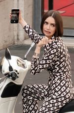 LILY COLLINS Filming a Scene Outside Fendi Store for Emily in Paris in Rome 05/08/2025