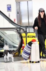 NINA DOBREV Arrives at LAX Airport in Los Angeles 06/10/2025