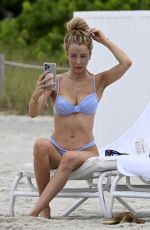 OLIVIA ATTWOOD in a Baby Blue Bikini at a Beach in Miami 06/02/2025