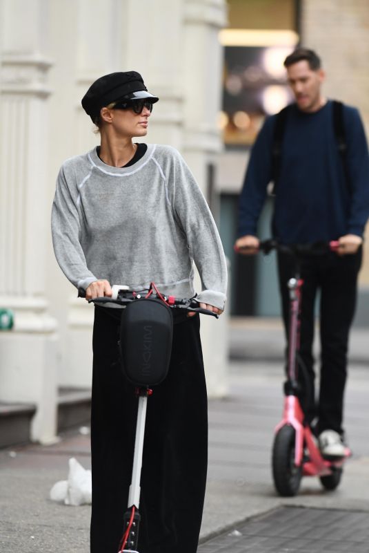 PARIS HILTON and Carter Reum Out on Scooters in New York 06/08/2025