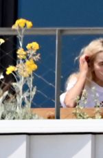 SABRINA CARPENTER on Her Hotel Balcony in Barcelona 06/07/2025