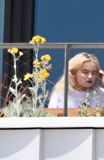 SABRINA CARPENTER on Her Hotel Balcony in Barcelona 06/07/2025