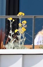 SABRINA CARPENTER on Her Hotel Balcony in Barcelona 06/07/2025