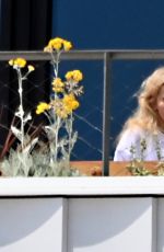 SABRINA CARPENTER on Her Hotel Balcony in Barcelona 06/07/2025