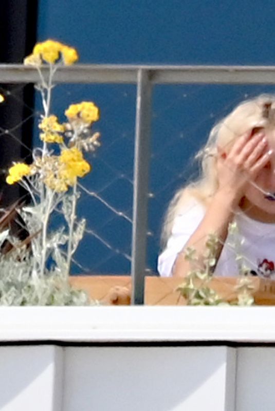 SABRINA CARPENTER on Her Hotel Balcony in Barcelona 06/07/2025