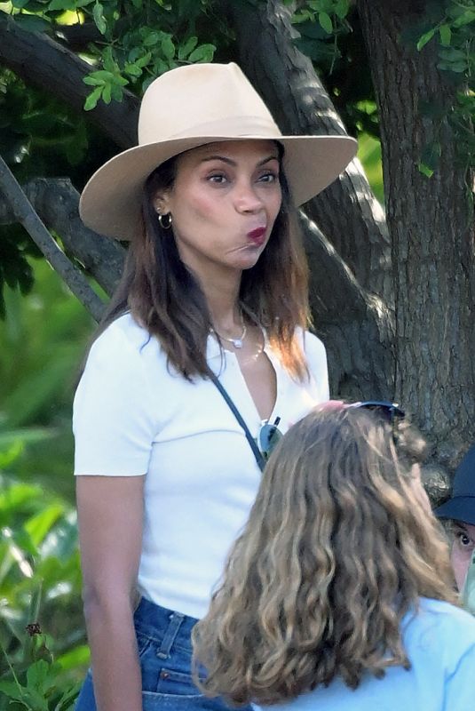 ZOE SALDANA Celebrates Her 47th Birthday with a Trip to Disneyland 06/14/2025