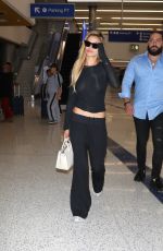 BROOKS NADER at LAX Airport in Los Angeles 07/18/2025