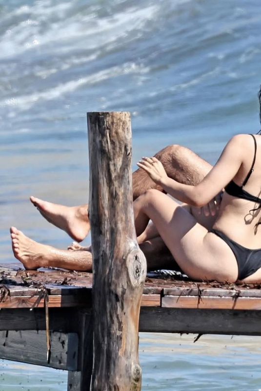 CAMILA CABELLO and Henry Junior Chalhoub at a Beach in Ibiza 07/22/2025