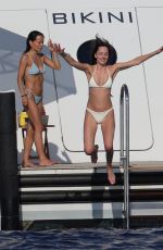 DAKOTA JOHNSON and KATE HUDSON in Bikinis at a Yach in Ibiza 07/02/2025