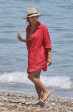 EVA LONGORIA in a Red Oversized Shirt Out in Marbella 06/30/2025