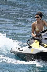 HAILEY BIEBER in Bikini at a Beach in Mallorca 07/10/2025