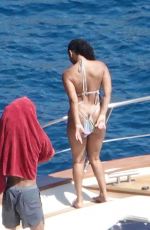 HALLE BAILEY in Bikini at Boat Day with Scott Bridgeway in Positano 06/28/2025