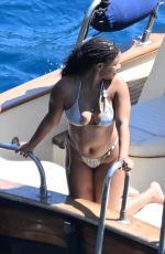 HALLE BAILEY in Bikini at Boat Day with Scott Bridgeway in Positano 06/28/2025
