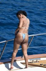 HALLE BAILEY in Bikini at Boat Day with Scott Bridgeway in Positano 06/28/2025