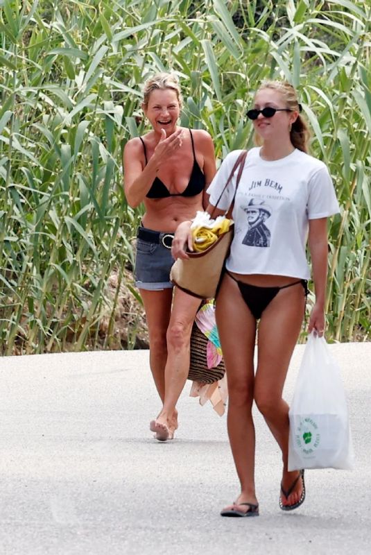KATE and LILA GRACE MOSS in Bikinis Out at a Beach in Ibiza 07/09/2025