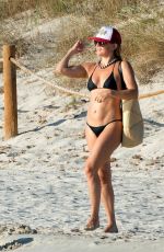 KATE HUDSON in Bikini at a Beach in Ibiza 07/02/2025