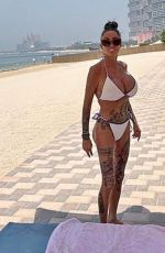 KATIE PRICE in a White Bikini at Holiday Trip Out in Dubai 07/01/2025