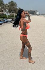 KATIE PRICE in Orange Bikini on Holiday Trip Out in Dubai 06/26/2025