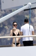 KATY PERRY Stuns in a Black Bikini on a Yacht, July 2025