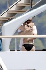 KATY PERRY Stuns in a Black Bikini on a Yacht, July 2025