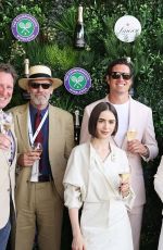 LILY COLLINS and Charlie Mcdowell at Mens