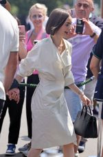 LILY COLLINS Arrives at Mens
