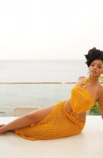 CHLOE BAILEY in an Orange Bikini at a Photoshoot 08/25/2025