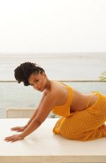 CHLOE BAILEY in an Orange Bikini at a Photoshoot 08/25/2025