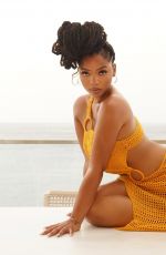 CHLOE BAILEY in an Orange Bikini at a Photoshoot 08/25/2025