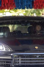 DAKOTA JOHNSON Shopping at Erewhon Market Before Getting Her Car Washed in Calabasas 08/12/2025