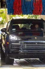DAKOTA JOHNSON Shopping at Erewhon Market Before Getting Her Car Washed in Calabasas 08/12/2025