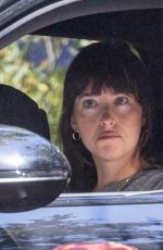 DAKOTA JOHNSON Shopping at Erewhon Market Before Getting Her Car Washed in Calabasas 08/12/2025