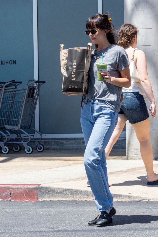 DAKOTA JOHNSON Shopping at Erewhon Market Before Getting Her Car Washed in Calabasas 08/12/2025
