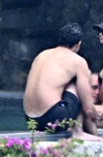 EMILY RATAJKOWSKI in Bikini with DJ Orazio Rispo at a Pool at Amalfi Coast 08/04/2025