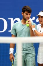 EMMA RADUCANU and Carlos Alcaraz at First Round of US Open Mixed Doubles at Flushing Meadows 08/19/2025