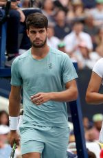 EMMA RADUCANU and Carlos Alcaraz at First Round of US Open Mixed Doubles at Flushing Meadows 08/19/2025