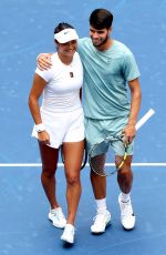 EMMA RADUCANU and Carlos Alcaraz at First Round of US Open Mixed Doubles at Flushing Meadows 08/19/2025