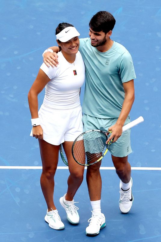 EMMA RADUCANU and Carlos Alcaraz at First Round of US Open Mixed Doubles at Flushing Meadows 08/19/2025