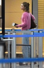 GIGI HADID and Bradley Cooper Arrives at JFK Airport in New York 08/23/2025