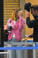 GIGI HADID and Bradley Cooper Arrives at JFK Airport in New York 08/23/2025
