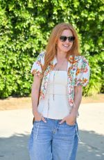 ISLA FISHER Arrives at Jennifer Klein