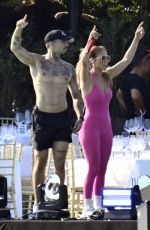 JENNIFER LOPEZ Rehearses in a Pink Jumpsuit at Cala di Volpe Hotel in Costa Smerlada 08/12/2025